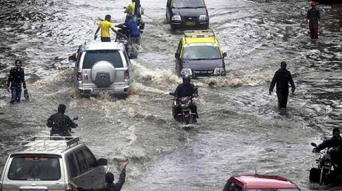 Train delays, jams, heavy rain in Mumbai, waterlogging