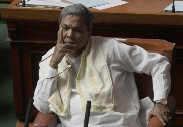 Siddaramaiah, caught on camera, snatching Mic from woman, fit of rage