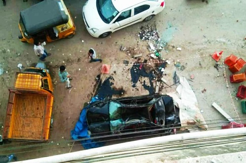 Killed, injured, car, fell off flyover, Hyderabad